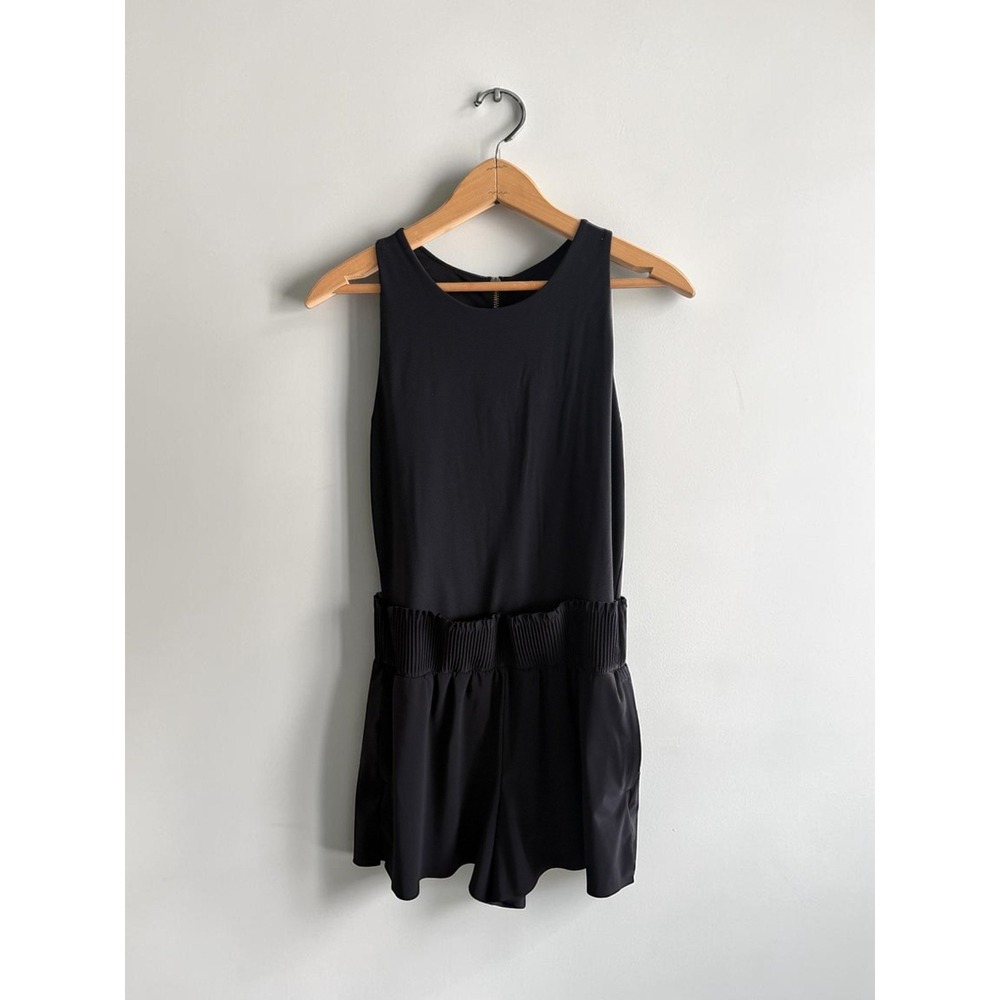 Athleta Cosmic Flutter Romper Black Sleeveless Pleated Waist Mini Jumpsuit M